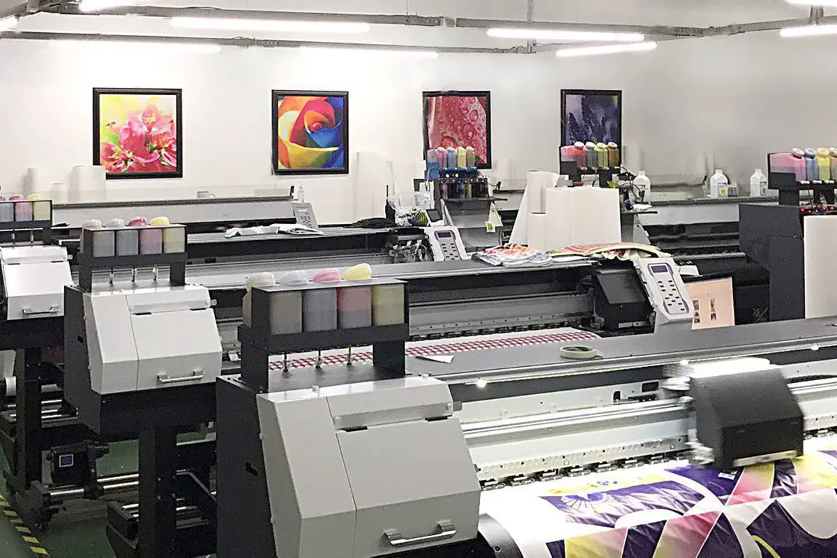 Wide-format printers producing multicolor jersey panels
